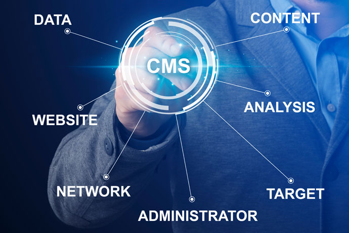 Finger touching holographic CMS logo.