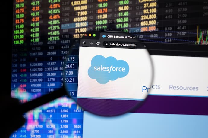 Salesforce company logo on a website with magnifying glass effect.